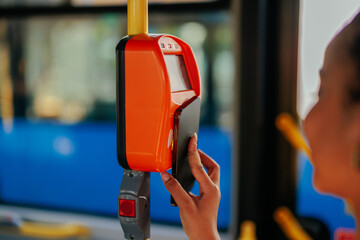 Travel card validation machine in the city transportation vehicle