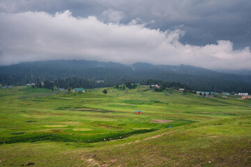 Fototapeta premium Gulmarg, known as Gulmarag in Kashmiri, is a town, hill station, popular skiing destination, and notified area committee in the Baramulla district of Jammu and Kashmir, India.