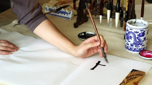 Traditional Chinese calligraphy, character translation means focus your heart and develop your spirit. Art equipment