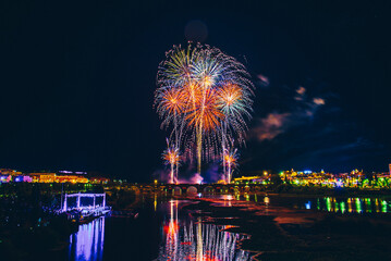 Fireworks over a park in the night sky, happy new year, year 2022-2023
