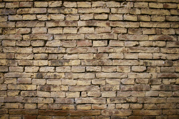 Unrevoked antique brick wall