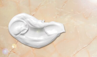 White Ñosmetic cream texture. Ð¡reamy product on texture background. Sunscreen for face creme, body lotion.