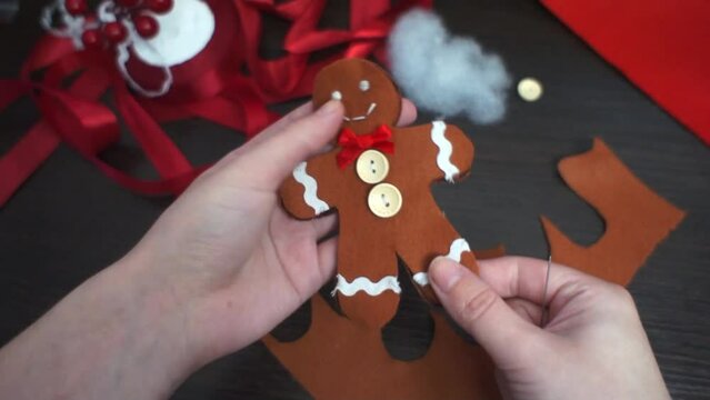 Christmas toy gingerbread man is ready. Step-by-step manufacturing instructions. Step