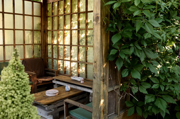 Fototapeta na wymiar A beautiful tea house in a green garden