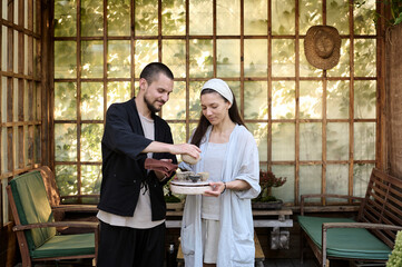 Traditional tea ceremony outdoor in a garden gazebo