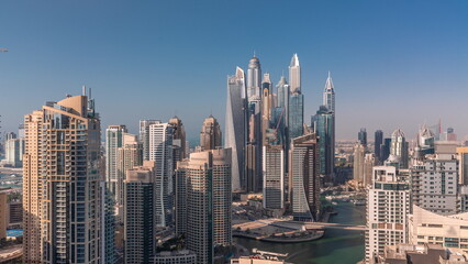 Fototapeta na wymiar View of various skyscrapers in tallest recidential block in Dubai Marina aerial timelapse