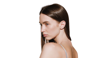 Fototapeta premium Side view portrait of beautiful young girl isolated over white background. Cosmetic procedures, beauty injections