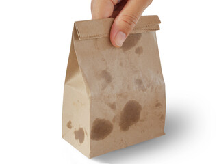 Paper bag of fried chickens and frenchfried on my hand 