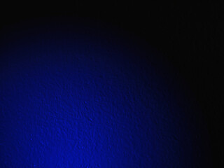 abstract blue wall or material is cracked and damaged with black gradient pattern.