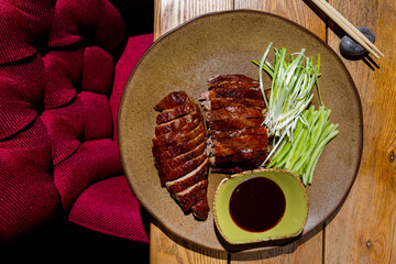 Fried chicken breast with leeks and cucumber