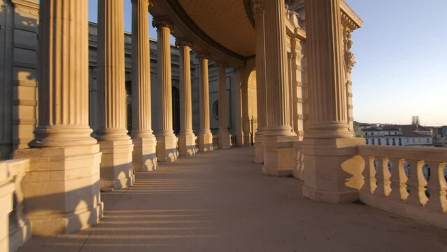 Travelling in a palace with large majestic columns in Palais Longchamp, Marseille, France