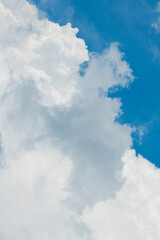 sky and clouds. blue sky and white and light gray clouds of different unexpected shapes and combinations for the background card banner postcard wallpaper