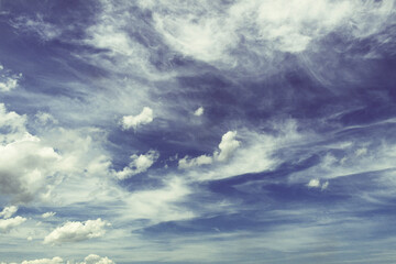 Obraz premium Blue sky background. Blue sky with white clouds. Beautiful nature. Heaven. Dramatic. Scenic