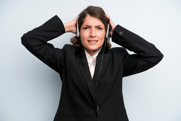 pretty young adult woman. telemarketing service concept