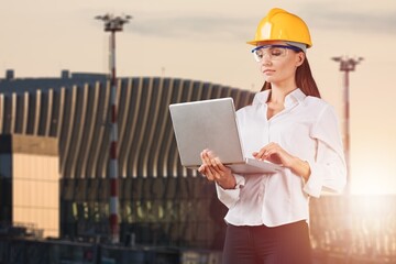 Silhouette of Engineer under inspection. Engineer man in waistcoats and hardhats and with documents.