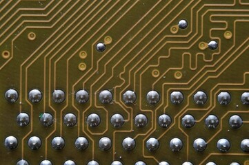 microprocessor on the background of the microcircuit of the motherboard.