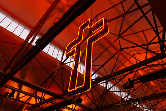 Dark MOFO 2022 winter feast hall neon cross decoration