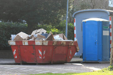 Loaded garbage dumpster