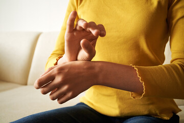 Young girl practicing EFT tapping or emotional freedom technique