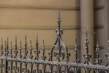 Historic metal fence with sharp tips