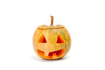 A pumpkin lantern, a Halloween attribute resembling a head with a frightening or funny face, shot against a white background.