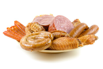 Assortment of sausages on a wooden plate on a white background. Smoked meat products.