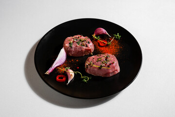 Raw pork steaks
