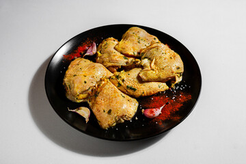 Raw marinated chicken meat with vegetables