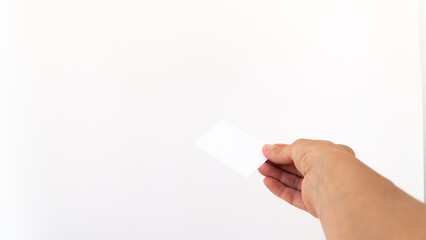 isolated right  hand gesture giving business card