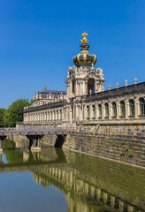 Fototapeta na wymiar Historic golden crown at the Kronentor gate in Dresden, Germany
