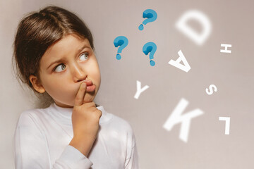 Thinking preschooler in a white blouse looks away with bulging eyes on a light background with question marks. Concept of brainstorming and ideas, solution - obrazy, fototapety, plakaty