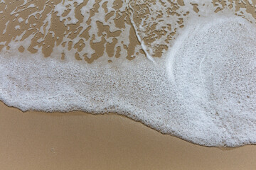 Sea Foam with Swirl Close Up at the Seashore