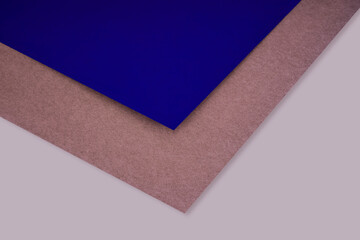 abstract brown blue background with lines forming triangle looks like side view of an open book plain vs textured cover