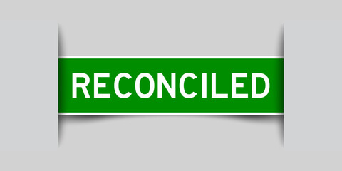 Green color square label sticker with word reconciled that inserted in gray background