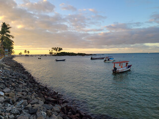 Amazing orange sunset on paradise island Morro de São Paulo in Bahia, Brazil