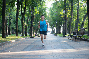 athletic sportsman runner running in sportswear outdoor