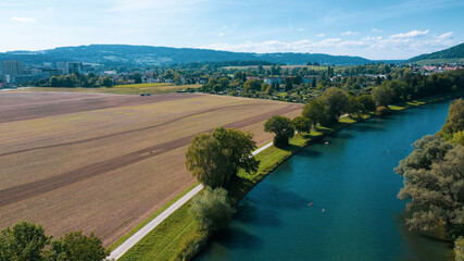 Drone view over the river and fields in the city of Zurich, Switzerland