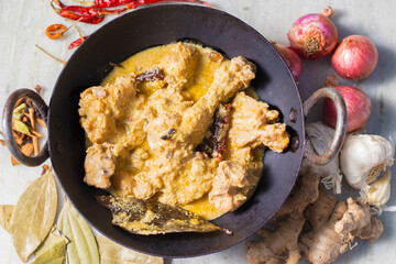Selective focus of Delicious Chicken Rezala is ready to serve.