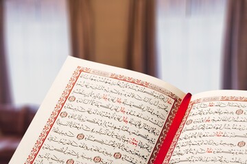 Opened Quran book for Muslim to recites as a devotion to God.