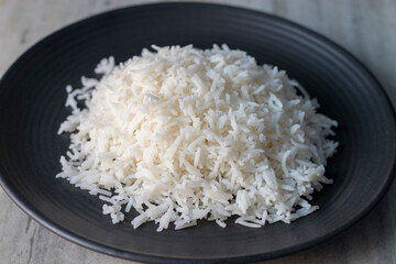 Basmati Rice on a black ceramic plate. 