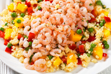 shrimps and millet pilaf with mango and veggies