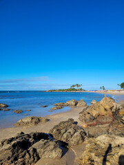 Fototapeta na wymiar beautiful beach with rocks in Gamboa da Bahia, Brazil