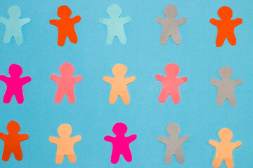 colorful paper people on pastel blue background, creative modern wallpaper