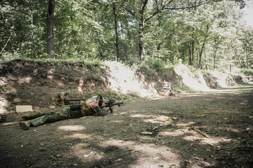 Shooting gun while lying down