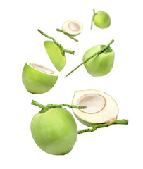 Young green coconut and half slice with coconut water flying in the air isolated on white background.