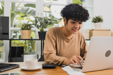 curly beautiful woman working online on laptop, home office and work from home concept