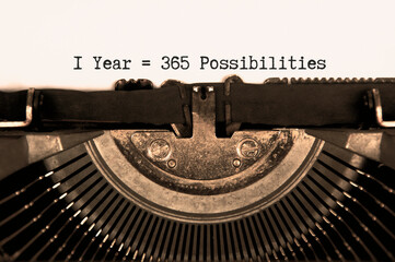 365 possibilities text on an old typewriter. Motivational concept.