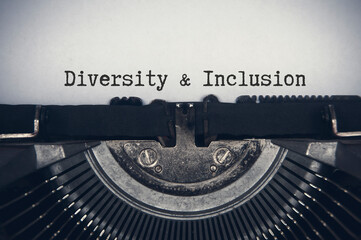 Diversity and inclusion text on an old typewriter. Business culture concept