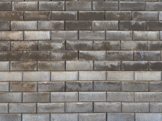 The wall is decorated with gray granite tiles with unmarked seams. Imitation of brickwork. Not seamless texture