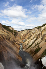 Fototapeta na wymiar Rocky Canyon and River in American Landscape. Grand Canyon of The Yellowstone. Yellowstone National Park. United States. Nature Background.